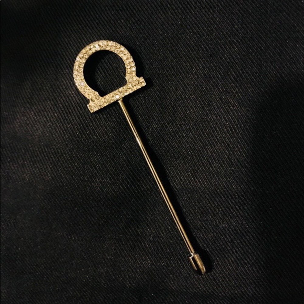 Salvatore Ferragamo crystal brooches